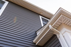 vinyl siding up the side of a new house
