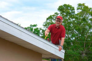 insurance person inspecting the roof
