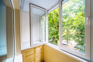 open window with a view of the forest