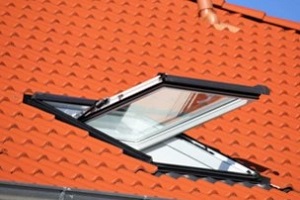 open skylight window on orange roof