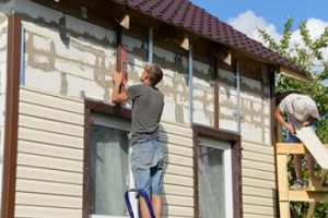new siding installation in process