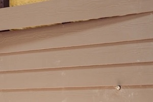 wood siding installation work in progress