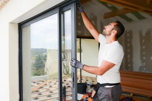 worker installing new windows