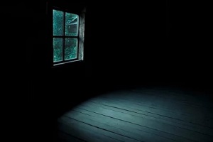 old window in a dark room
