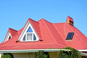 valley and gable roofing construction with attic windows
